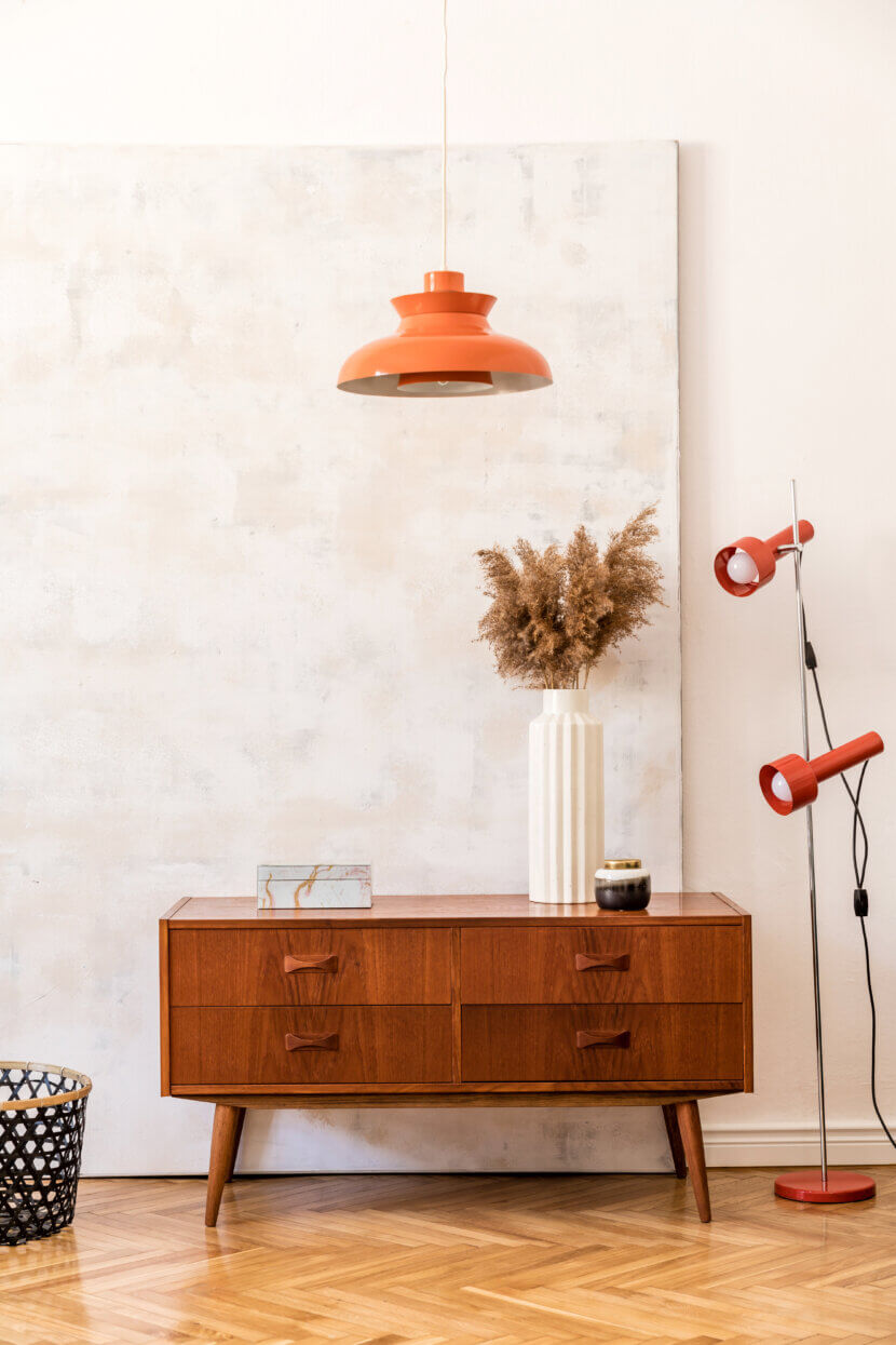 Stylish composition of retro living room with mock up poster fra